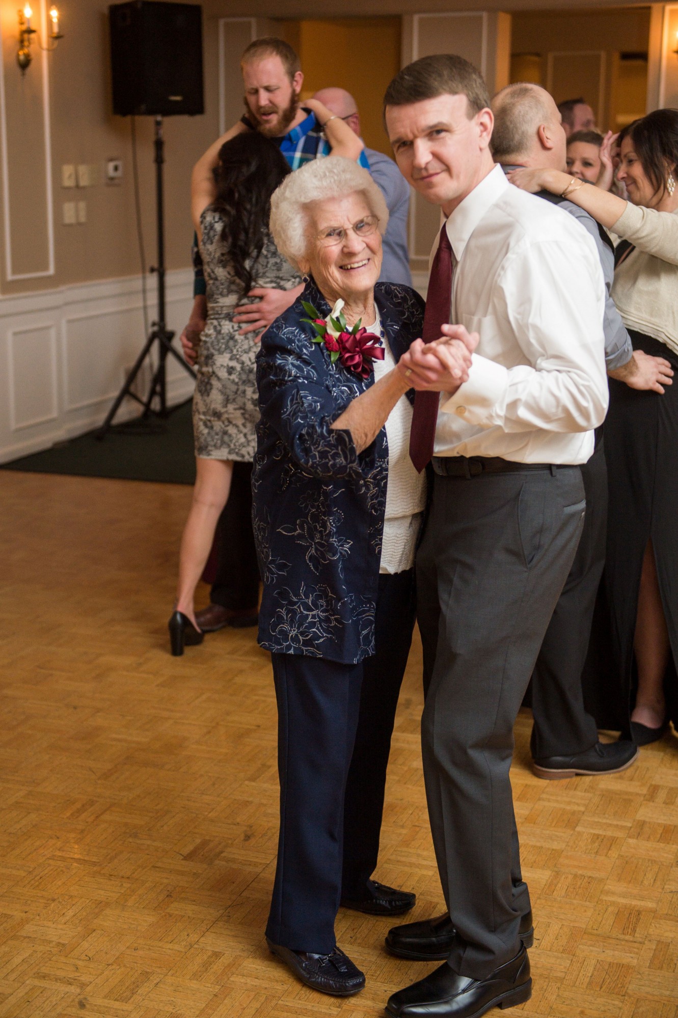 Brad is dancing with his grandmother at his wedding.