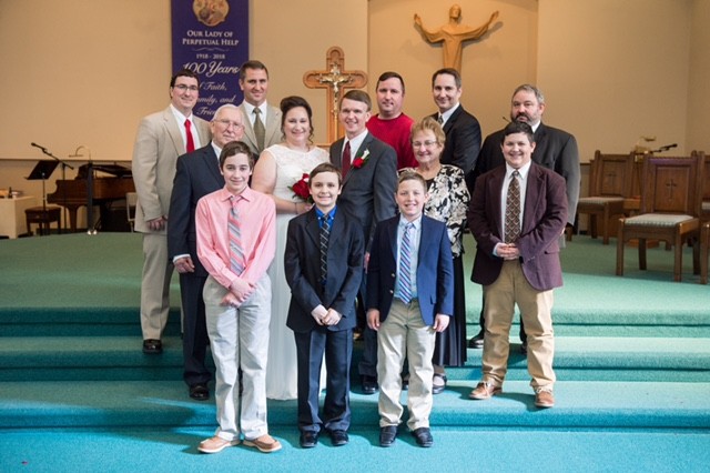 Brad and Mary Beth on their wedding day, with their families.